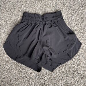 Black lululemon track that short 3” size 2